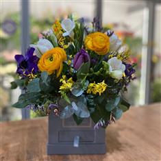 Colourful spring box with healing stone