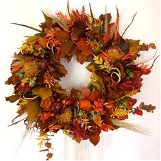 Autumn wreath with mixed preserved leaves