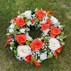Vibrant orange and white wreath
